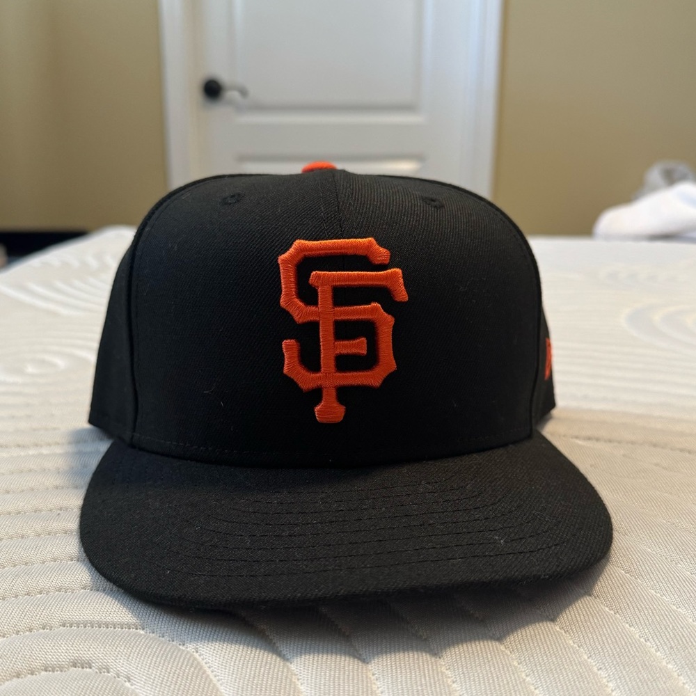 SF Giants Fitted 7 3/8. Worn a couple times.